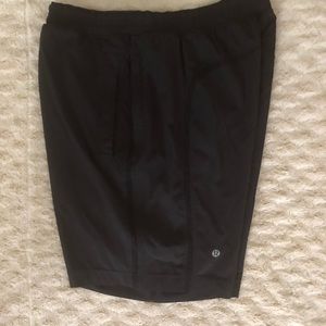 Lululemon pacebreaker short with line 9” inseam.